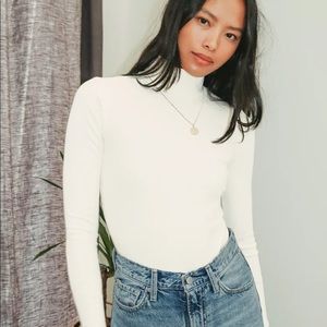 White mockneck ribbed bodysuit